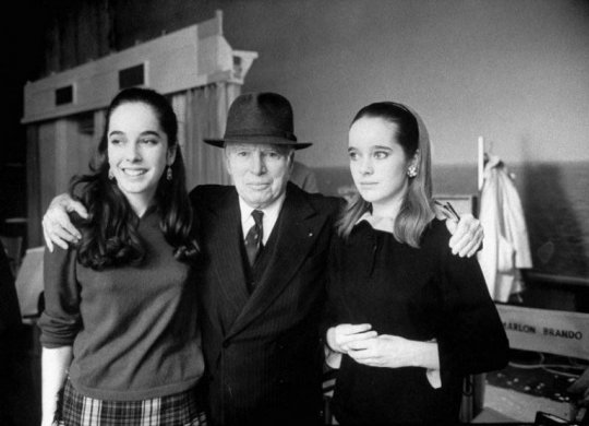 Charlie Chaplin with his daughters