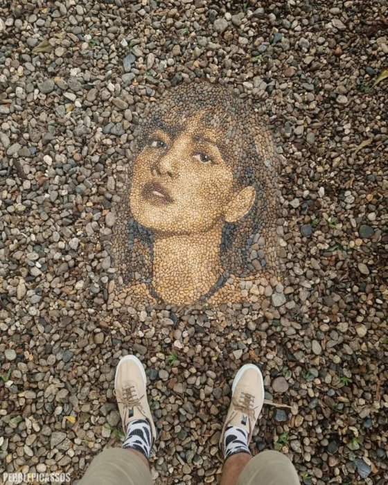 ქვიშისგან გამოსახული ლა ლიზას სახე